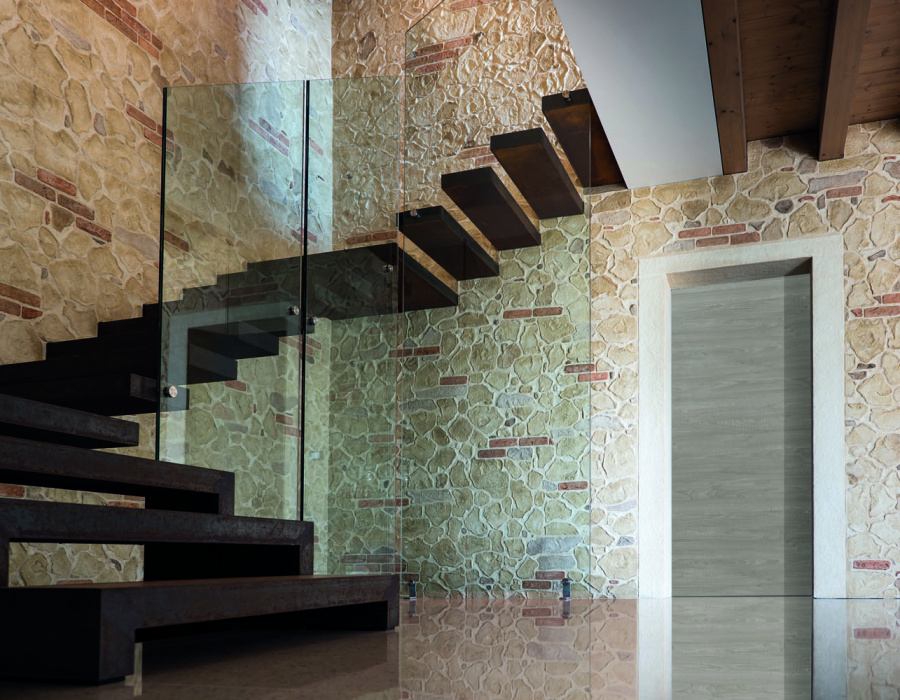 Plam Stone, stamped wall with brick, giallo tufo and brown finish, mould Pietra Vecchia + Montana. Private villa, Maser (Italy)